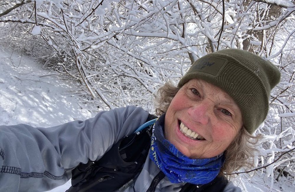 Oboz Footwear Local Hero Roxanne Strine hiking in the snow