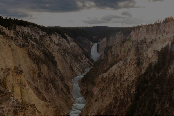 Powerful river water flowing in the Lower Falls of the Yellowstone National Park.