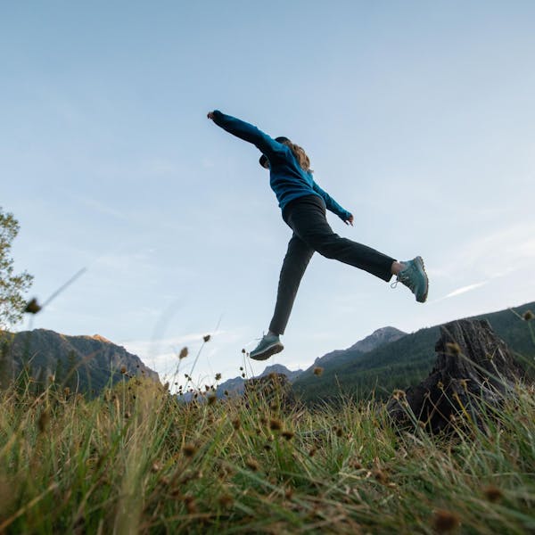 Jumping along the trail in the Hyalite Low waterproof hiker.