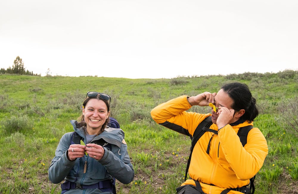 Hikers sharing laughs on the trail