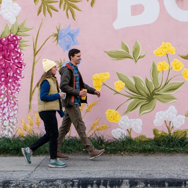 Walking in town wearing the Oboz Hyalite waterproof hiking boots.