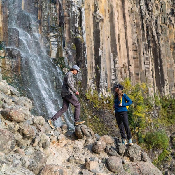 Hiking near a waterfall in the Oboz Hyalite waterproof shoes.