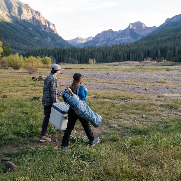 Hiking to a picnic site in the mountains wearing Oboz Hyalite waterproof shoes.