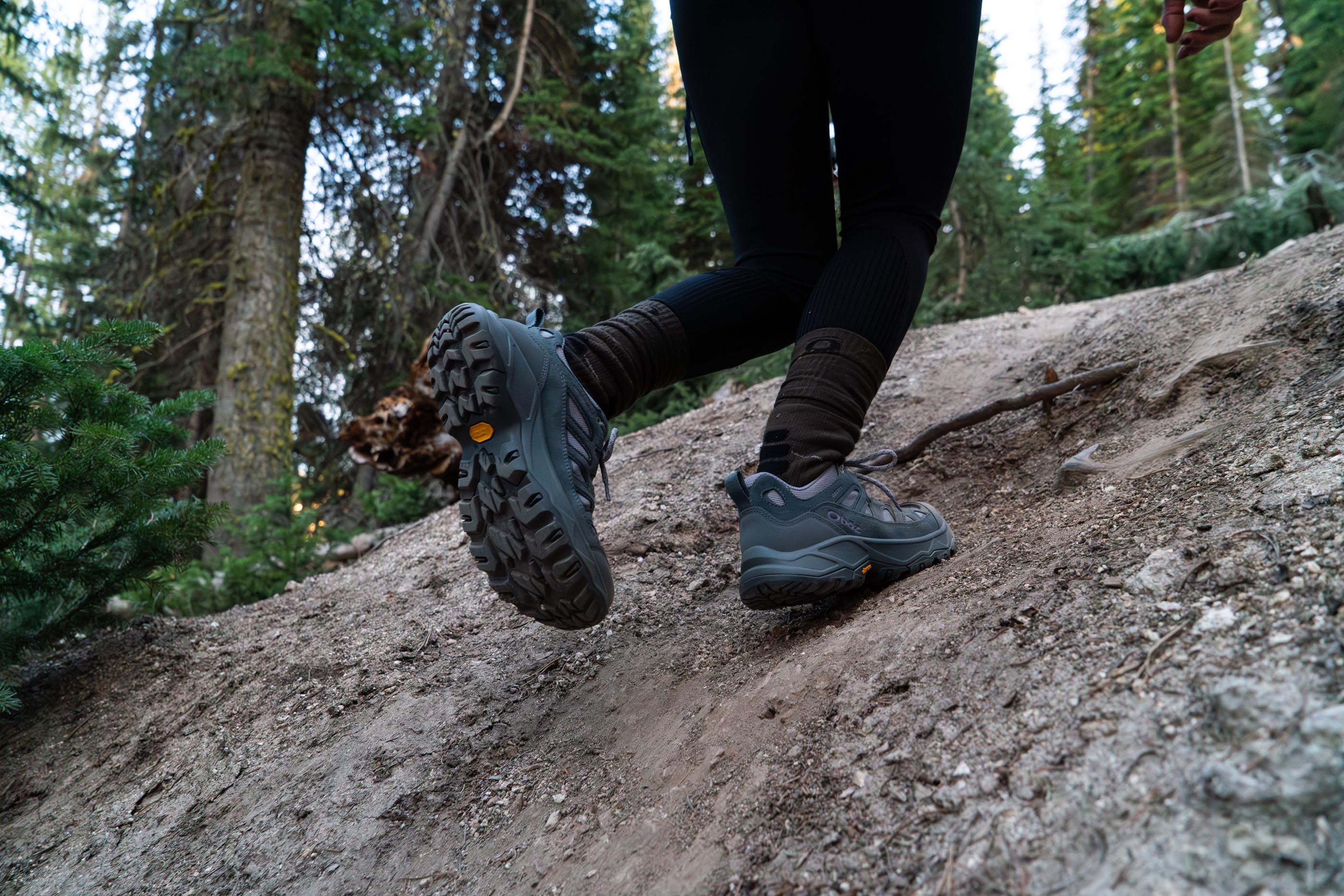 Oboz Sawtooth Ascent hiking boot on a rocky trail in Montana.