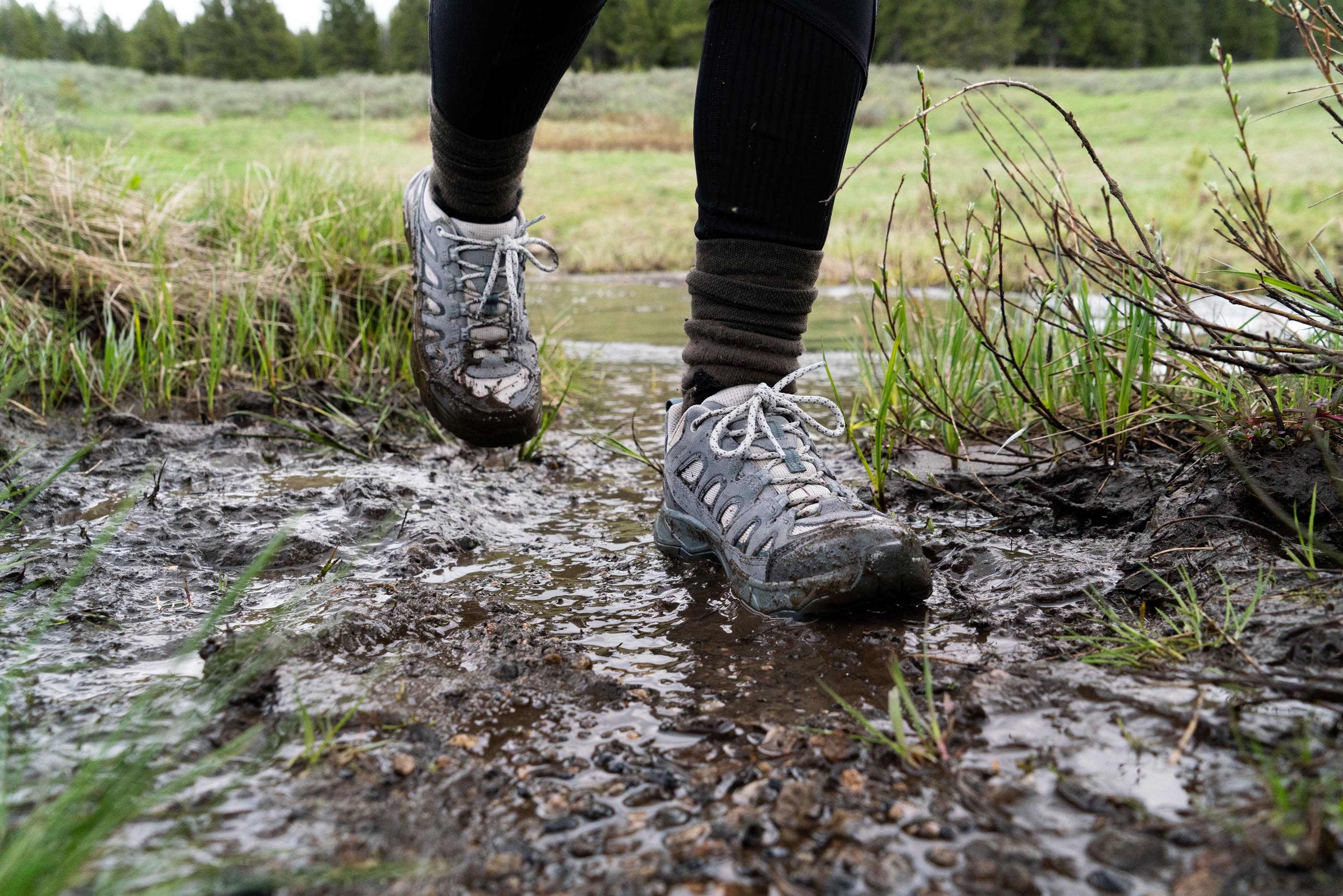 Oboz Sawtooth Ascent hiking boot on a creek crossing.