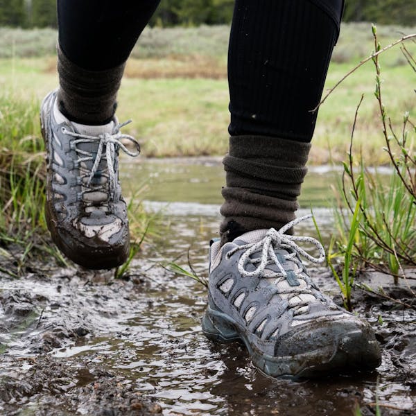 Oboz Sawtooth Ascent hiking boot on a creek crossing.