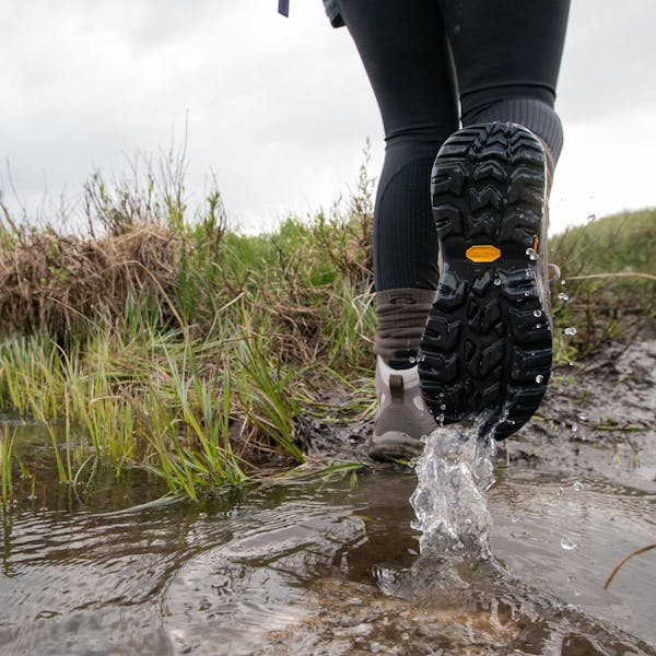 Passing a creek crossing in the Ascent Mid hiking boots.