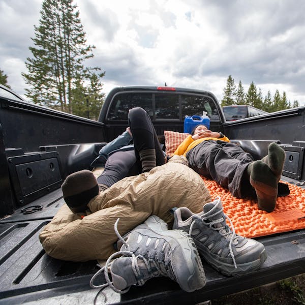 Relaxing after a trek in the Oboz Sawtooth Ascent Mid skiing boots.