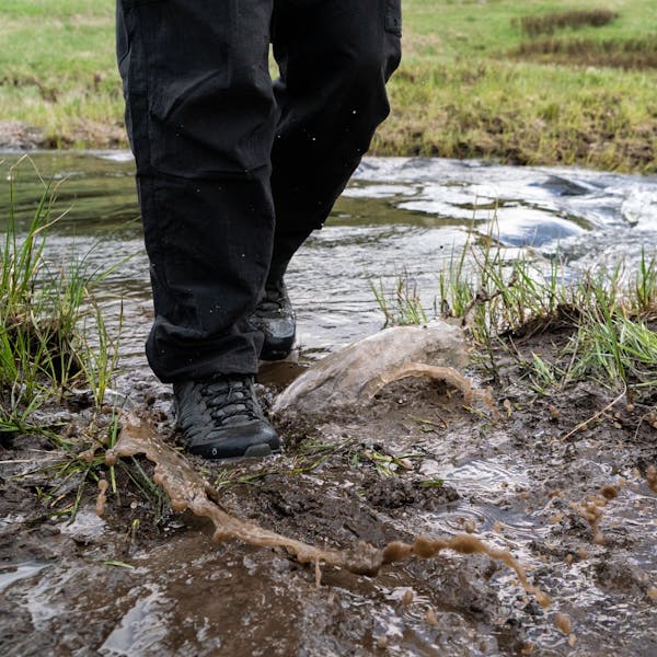 Waking through a creek in the Oboz Sawtooth Ascent hiking boots.