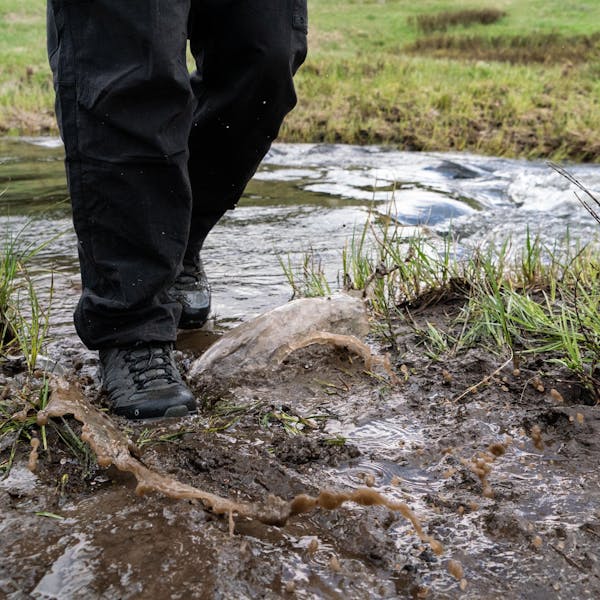 Waking through a creek in the Oboz Sawtooth Ascent hiking boots.