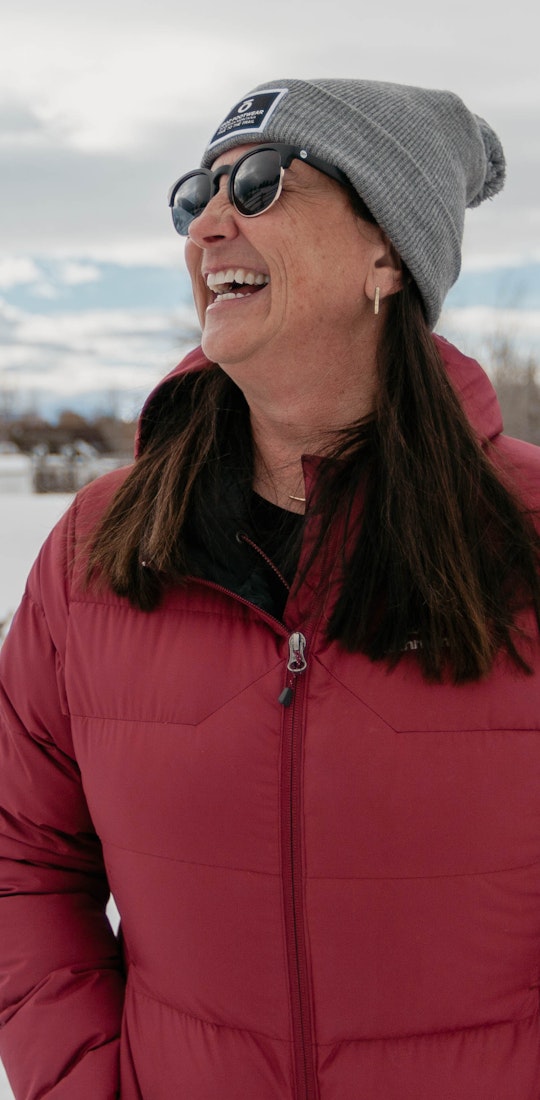 Oboz President Amy Beck smiling on a local Bozeman trail during the wintertime