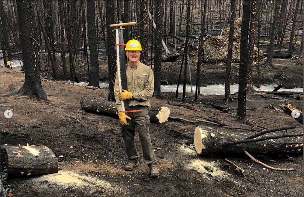 Oboz Footwear Trailblazer Jeff Randa performing forest maintenance.