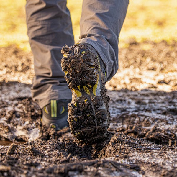 Sawtooth II hiking through mud
