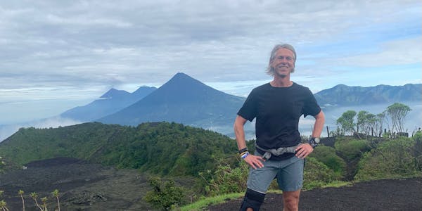 Oboz Trailblazer Buddy Teaster smiling while hiking.