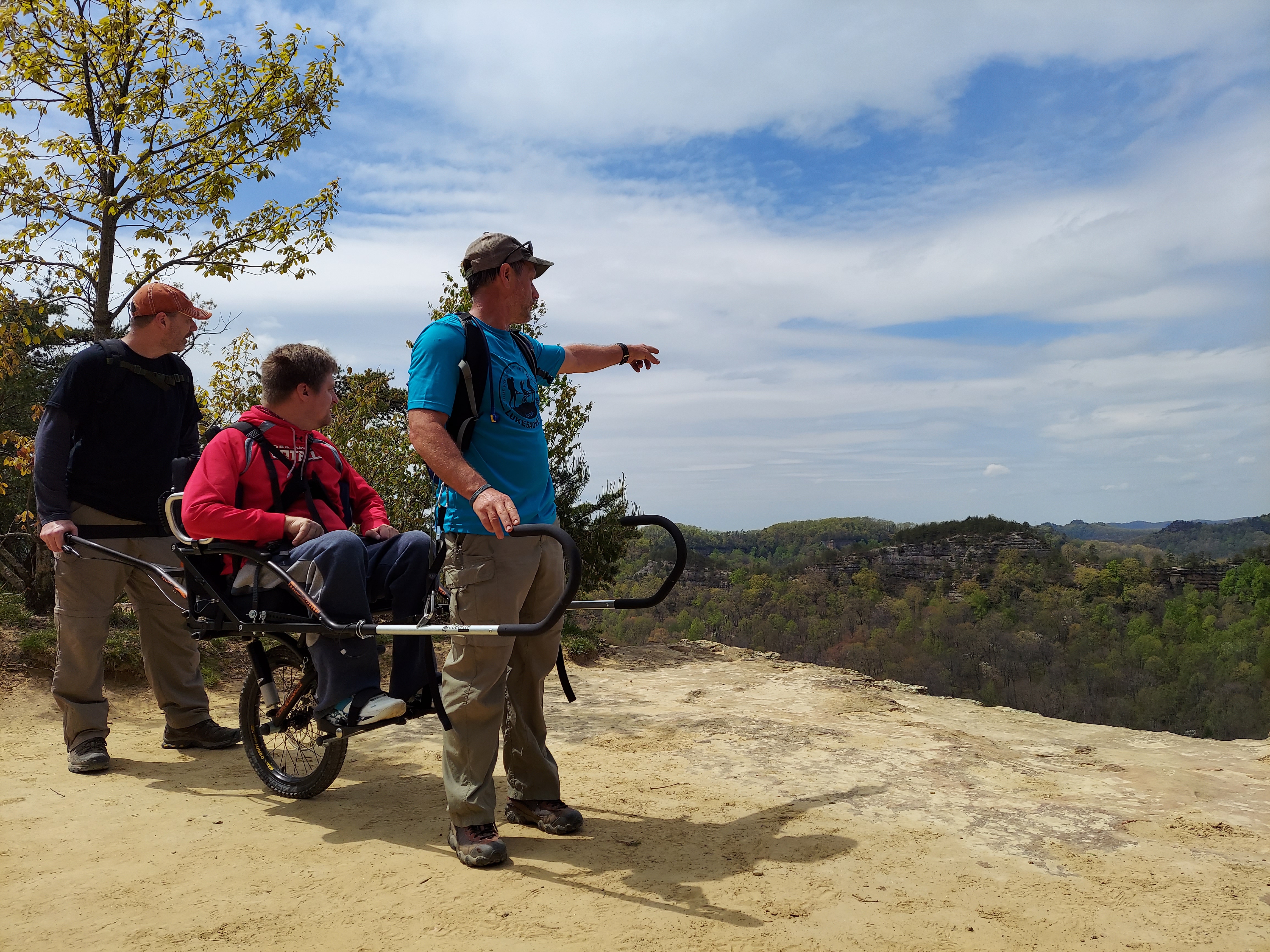 Oboz Trailblazer Kevin Schwieger and his team on a hike for his nonprofit, Luke5Adventures.