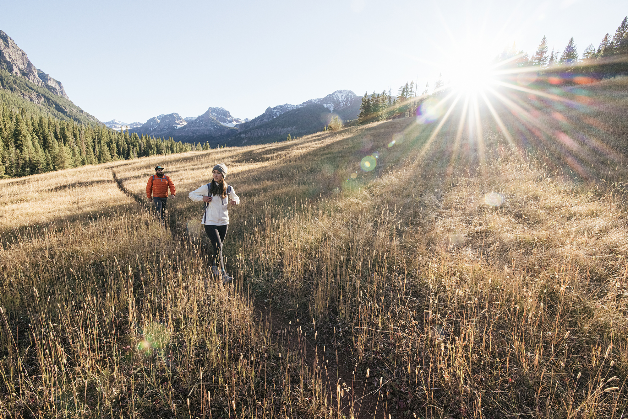 Two people hiking in the Oboz Sawtooth II Low hiking boots.