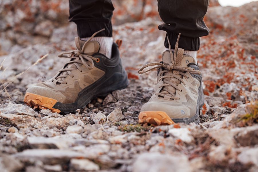 Oboz Katabatic Low hiking shoe in rocky terrain. 