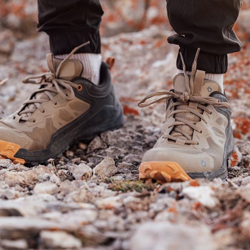 Oboz Katabatic Low hiking shoe in rocky terrain.
