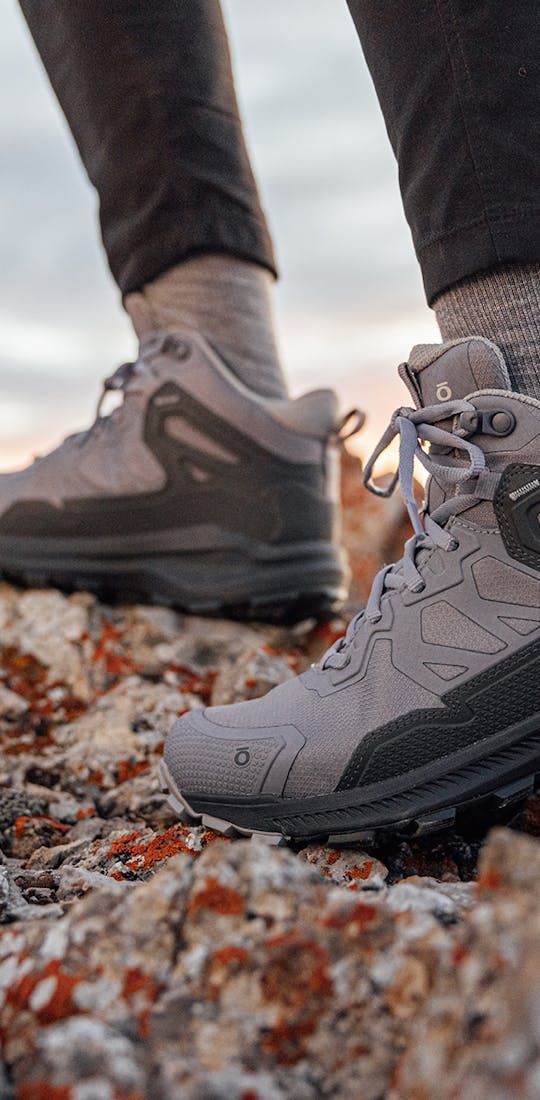 Closeup of the Women's Oboz Katabatic Mid on a rocky trail.