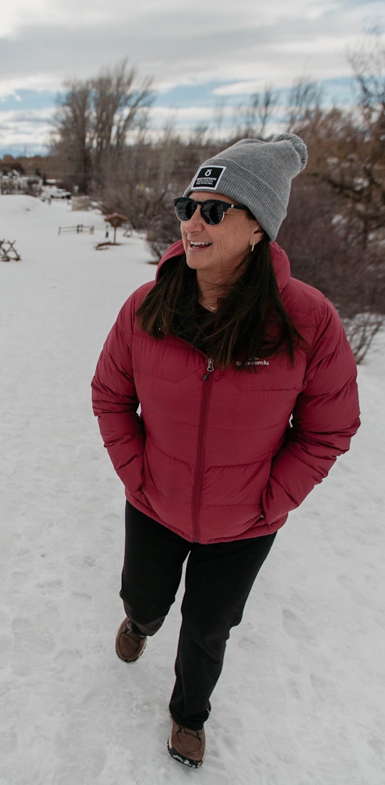 Amy Beck and a friend hiking on the snowy trails of Peet's Hill in Bozeman, Montana while wearing winter Oboz boots.