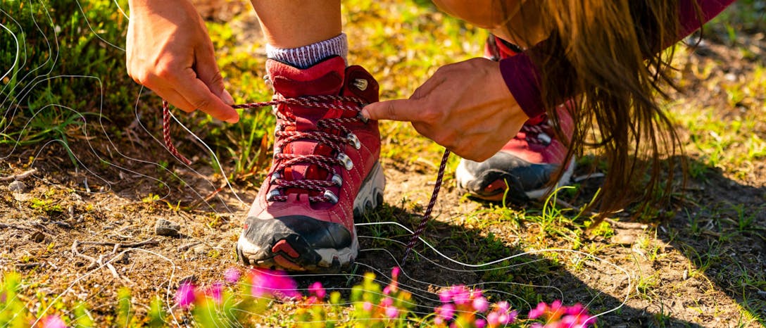 Women's Oboz Bridger Mid waterproof hiking boots in the Rio Red color.