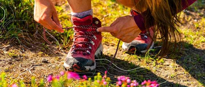 Women's Oboz Bridger Mid waterproof hiking boots in the Rio Red color.
