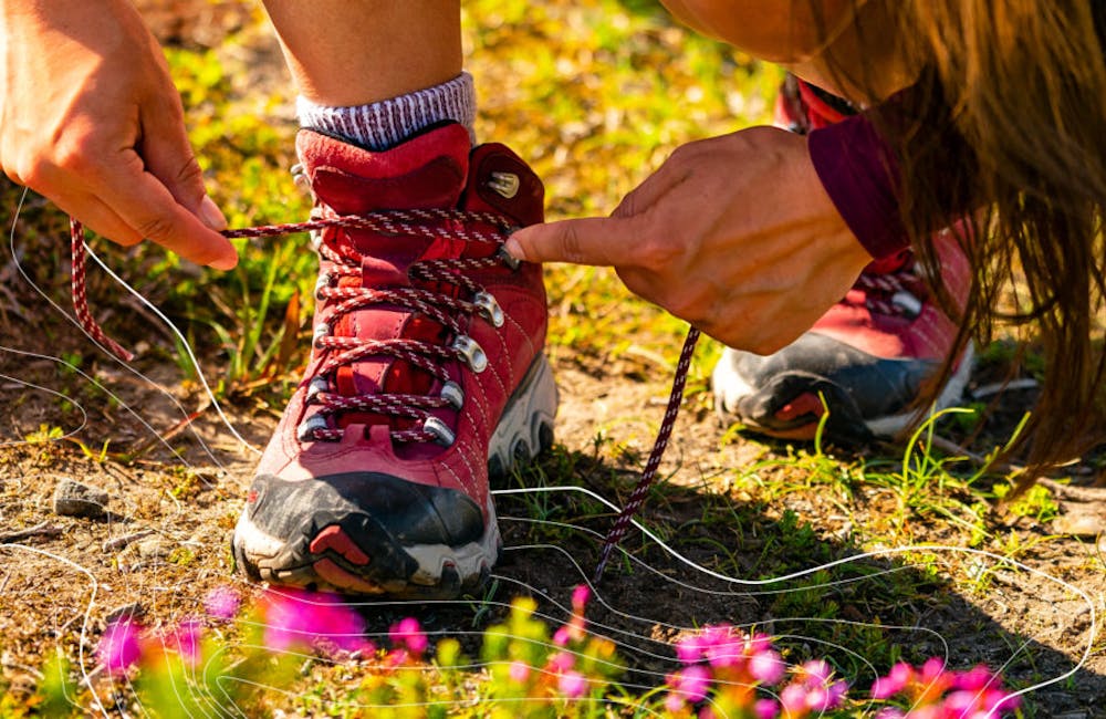 Women's Oboz Bridger Mid waterproof hiking boots in the Rio Red color.